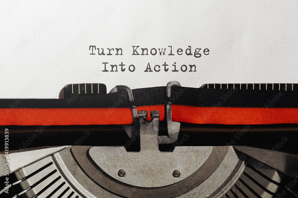 Poster text turn knowledge into action typed on retro typewriter