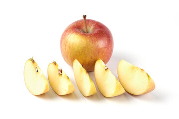 Red sliced apples isolated on white background