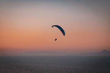 Parachuting - Paragliding in sunset