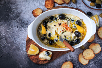 Baked Feta Cheese with Olives and Lemon.
