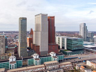 Fototapeta premium Aerial Drone view of The Hague Downtown Skyscrapers looking towards the North Sea