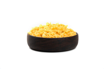 Pile of raw macaroni in wooden bowl on white background