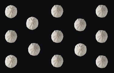 Khinkali with raw dough on a black background, collage