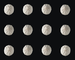 Khinkali with raw dough on a black background, collage