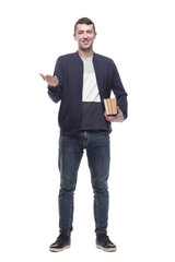 young man with a stack of books . isolated on a white