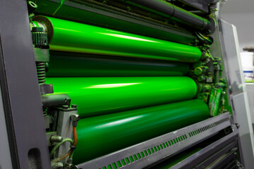 Color and glossy rollers of offset printing machine. offset ink colour. Fluorescent Green