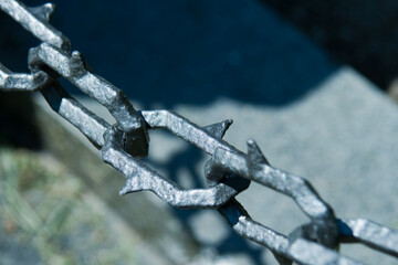 Close up steel chain with spikes