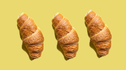 croissant on colored background fresh bakery sweet dessert bun snack healthy meal top view copy space for text food background rustic image