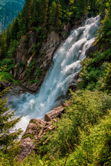 Naklejka na ściany i meble Panoramic view of the Krimmler waterfalls, the highest waterfalls in Austria.