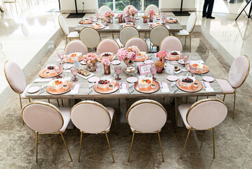 Indoor pre wedding breakfast with beautiful pink and white tones