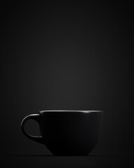 Black mug on a black background. Copy space. Drinks theme.