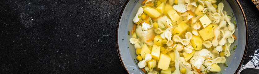 soup vegetable first course meal broth, potatoe, cauliflower, pasta no meat vegetarian or vegan...