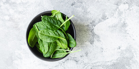 fresh spinach leaves healthy green food on the table cooking meal snack top copy space food...