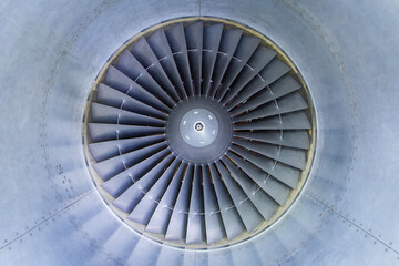 View into an airplane engine with fan blades