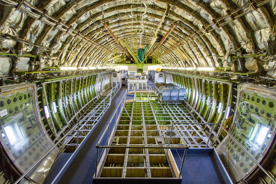 Inside view of a dismantled widebody airplane fuselage 