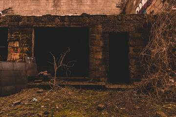 Fototapeta premium An old abandoned industrial area with graffitis