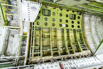 Inside view of airplane fuselage during maintenance - obrazy, fototapety, plakaty