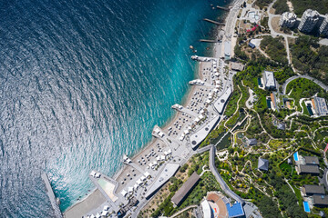 Multi-level equipped beach of the sanatorium and resort complex in the Crimea. Shooting from a drone.