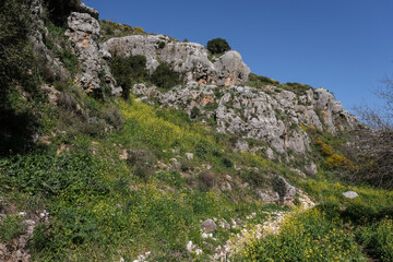 Colorful karstic rock formations and caves in the narrow canyon of  Nahal [stream] Aviv, east of Upper Galilee, Northern Israel, south of Lebanon border, Israel.