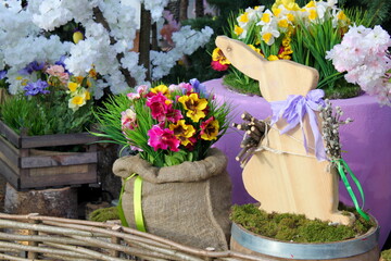 Festive decoration of the city streets for the spring holidays.  happy Easter. Easter bunny and spring flowers
