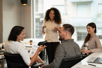 diverse business workgroup discussing or planning new project in the office. .