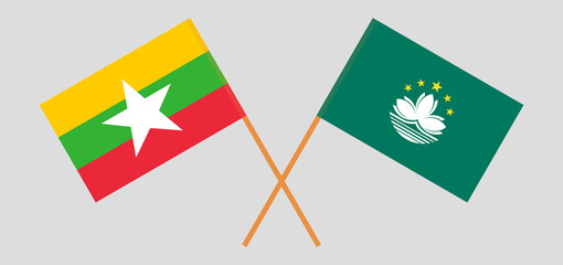 Crossed flags of Myanmar and Macau. Official colors. Correct proportion