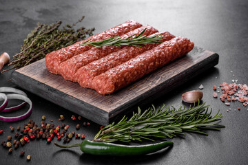 Fresh raw mince for grilled kebab with spices and herbs