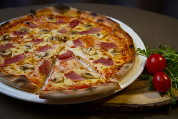 pizza with mushrooms and tomatoes