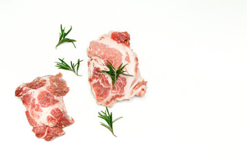 Fresh raw beef meat steaks with rosemary isolated on white background, copy space, food cooking at home, top view