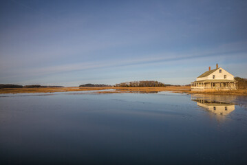 USA, Massachusetts, Cape Ann, Essex. House on Essex Bay.