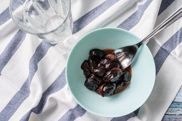 easy stewed prunes cooked dry plum fruit in a bowl on the table