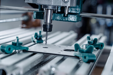 CNC milling machine cutting aluminium  part.