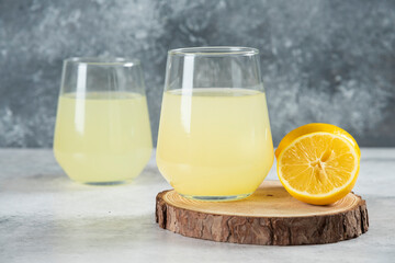 Two cups of tasty lemonade with lemon slices