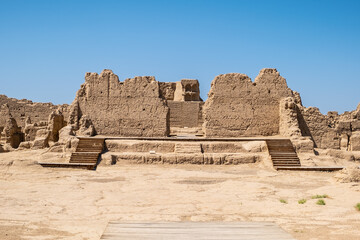 Remains of buddist temple with destroyed and cracked walls  in ancient jiaohe ruins at the silk way...