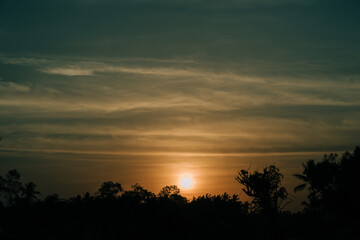 Obraz premium sunset over the river