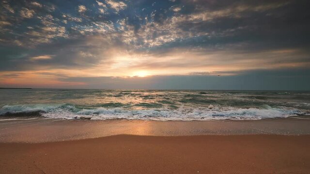 Ocean sunrise and tropical beach on island, 4k video