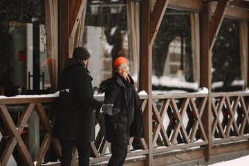 African american couple in a winter city