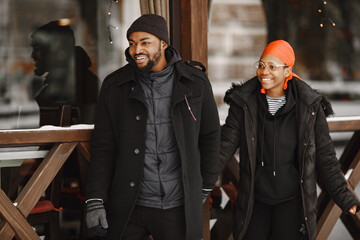 African american couple in a winter city