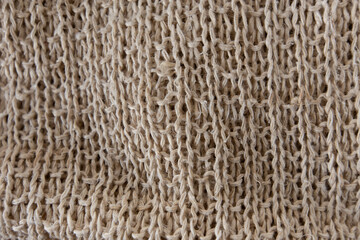 Natural fabric handmade from rough hemp thread.