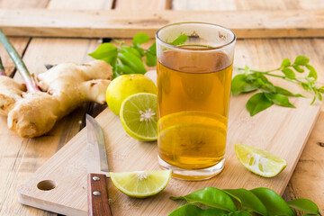 hot honey lemon ginger  herbal drink health care for sore throat arrangement flat lay style on...