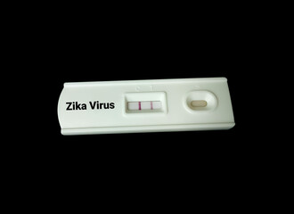 Rapid testing device or cassette for zika virus isolated with black background, showing positive result, copy space