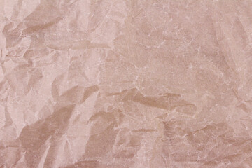 Fototapeta premium Crumpled blank paper brown background