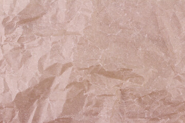 Crumpled blank paper brown background