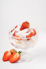 Fresh strawberry fruit salad on pure white background