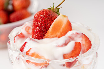 Fresh strawberry fruit salad on pure white background