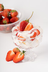 Fresh strawberry fruit salad on pure white background