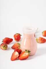 Strawberry milkshake on pure white background