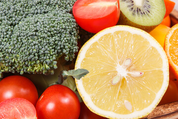 Natural fruits and vegetables in wooden box. Nutritious food containing minerals and vitamins