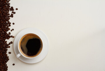 cup of coffee with beans
