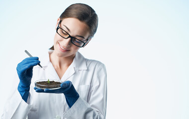 ecology woman agronomist flora soil and flower in a pot